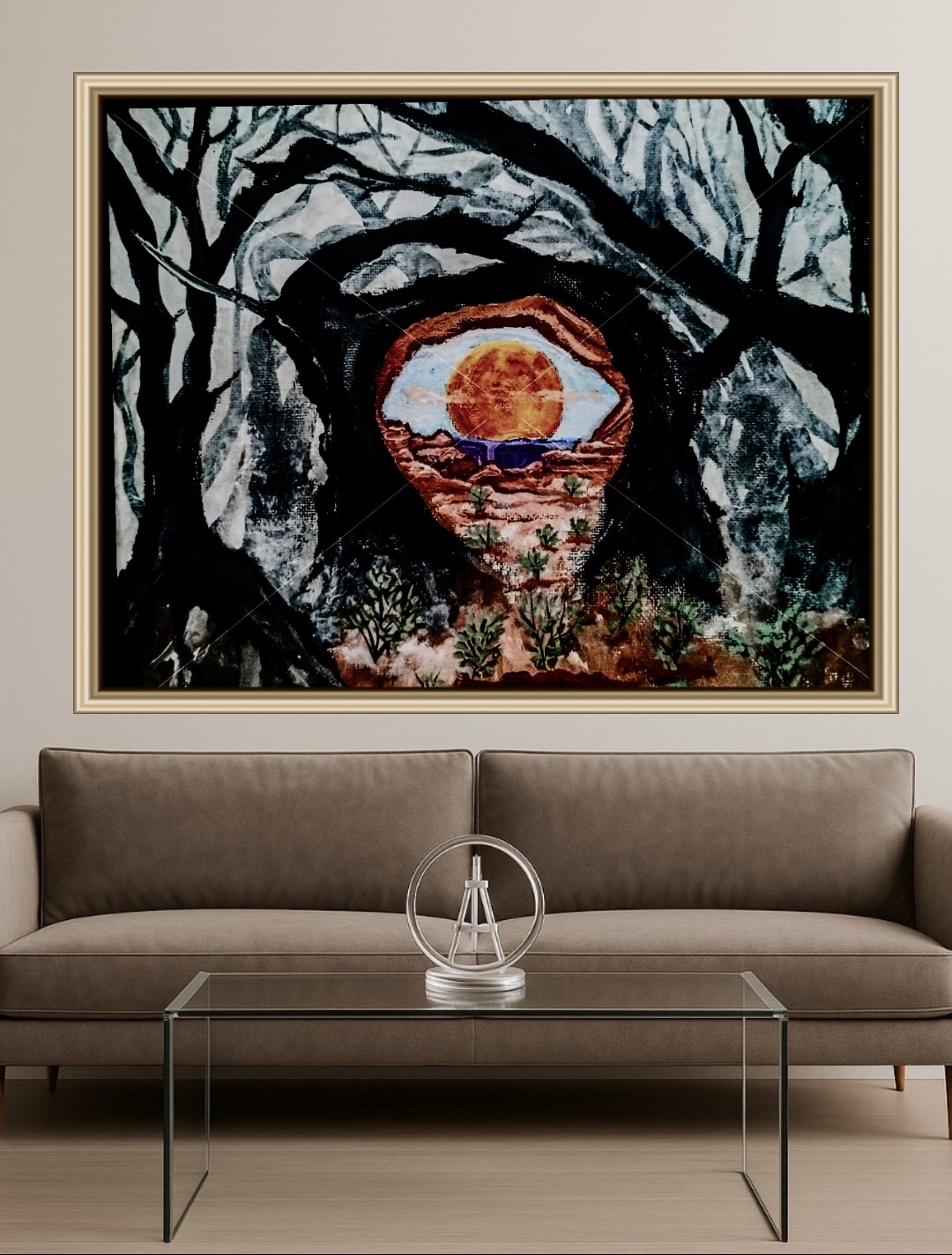 Abstract painting with a vivid eye and branches above a modern sofa.