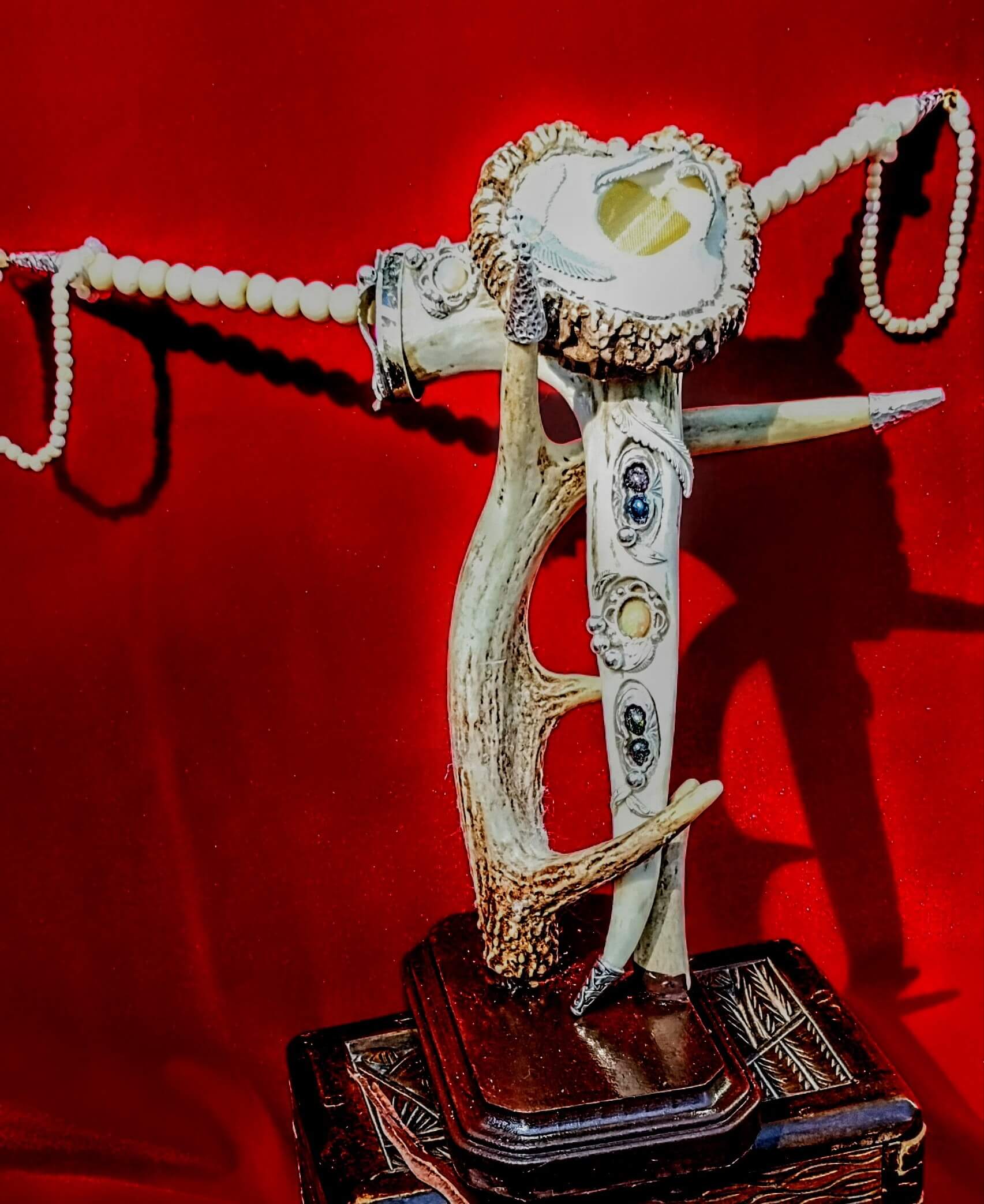 Unique antler design against red background