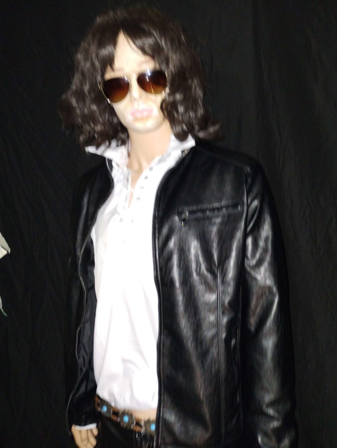 Mannequin with sunglasses and leather jacket
