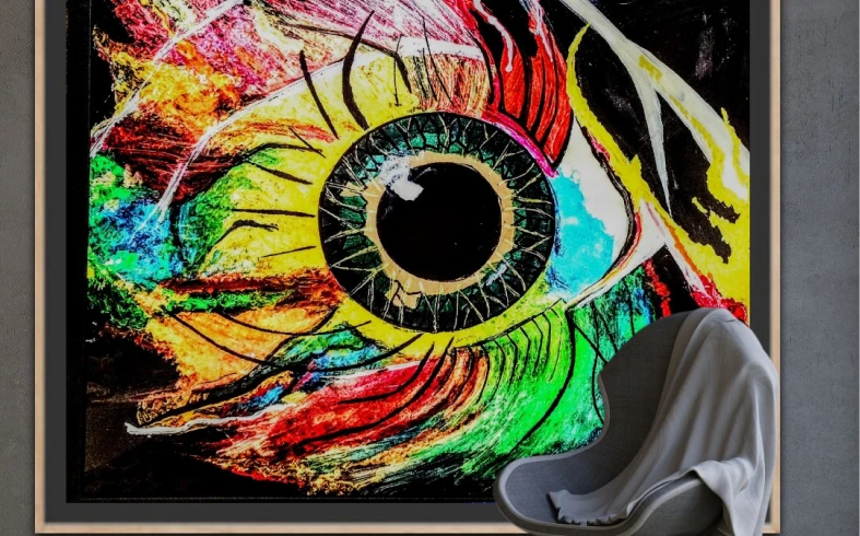 Colorful eye artwork with chair